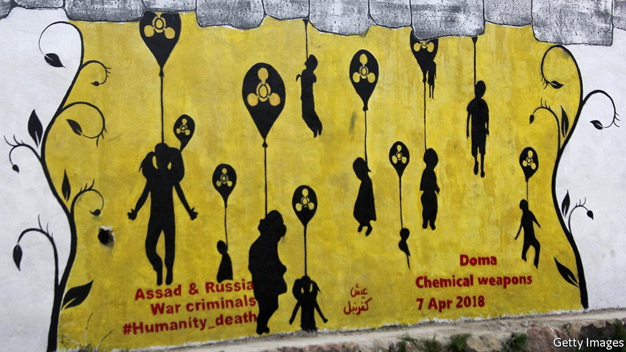 IDLIB, SYRIA - APRIL 08: Demonstrators draw picture on a wall that describe the poisonous gas attack as they gather to protest against Assad regime forces' allegedly conducted poisonous gas attack to Duma town of Eastern Ghouta, in Kafranbel town of Idlib, Syria on April 08, 2018. (Photo by Muhammed es Sami/Anadolu Agency/Getty Images)