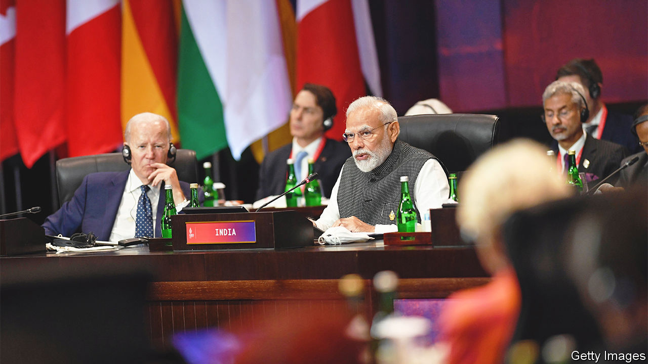 BALI, INDONESIA - NOVEMBER 15: (----EDITORIAL USE ONLY - MANDATORY CREDIT - "ANTARA PHOTO / PRASETYO UTOMO/ POOL / HANDOUT" - NO MARKETING NO ADVERTISING CAMPAIGNS - DISTRIBUTED AS A SERVICE TO CLIENTS----) President of the United States of America Joe Biden (L) and Prime Minister of India Narendra Damodardas Modi (R) attend the opening ceremony of the G20 Leaders' Summit in Bali's southern peninsula Nusa Dua, Indonesia on November 15, 2022. (Photo by Prasetyo Utomo / Antara Photo /Pool /Handout/Anadolu Agency via Getty Images)
